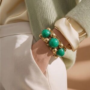 Elegant Gold Bracelet with Green Stones